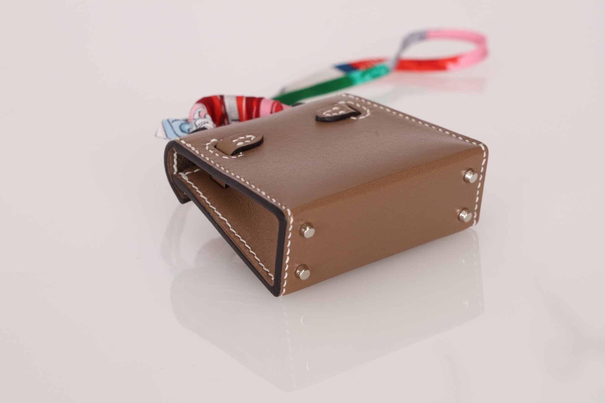 Hermès 2020 Etoupe Tadelakt Micro Kelly Twilly Bag Charm - FashioNica