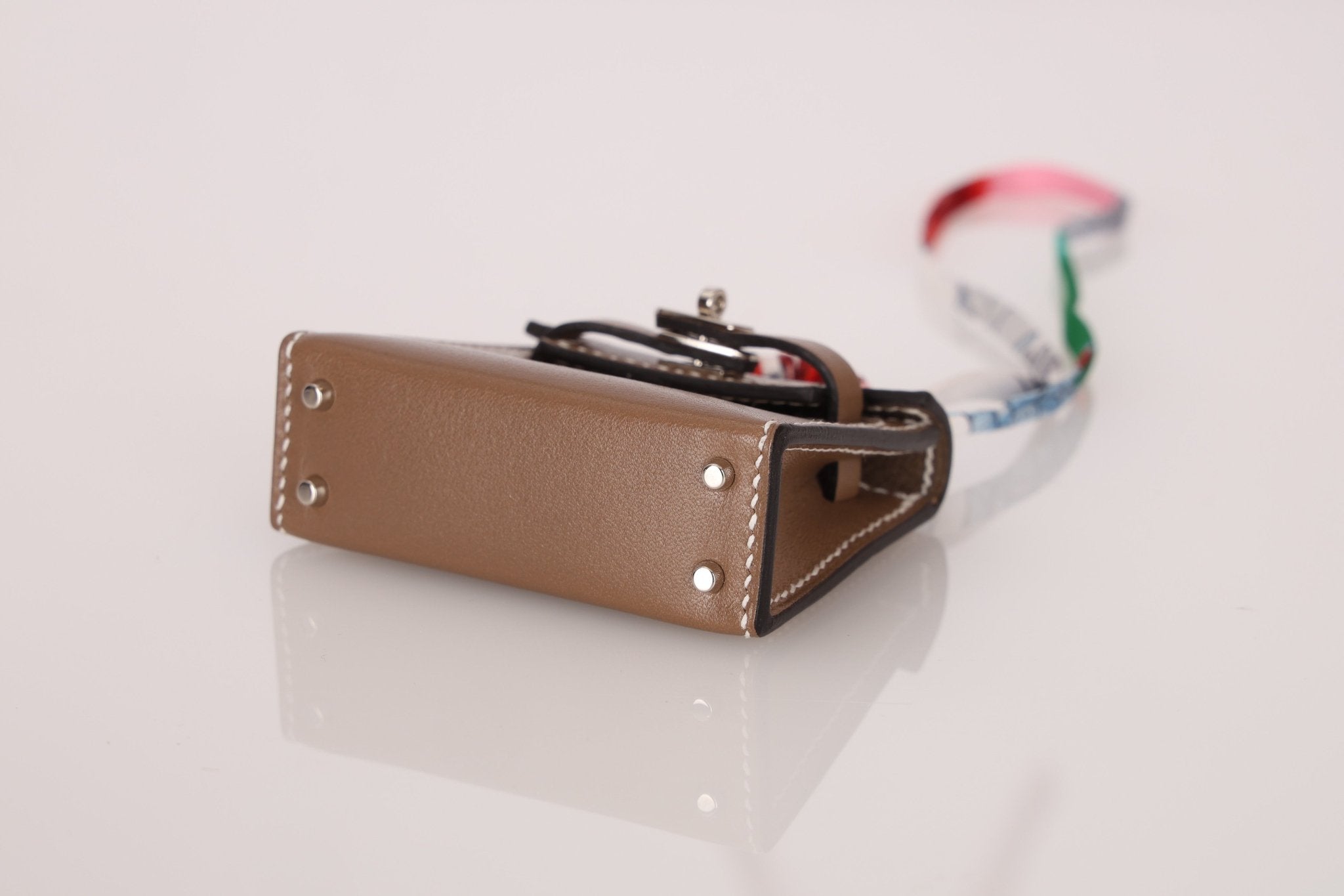 Hermès 2020 Etoupe Tadelakt Micro Kelly Twilly Bag Charm - FashioNica