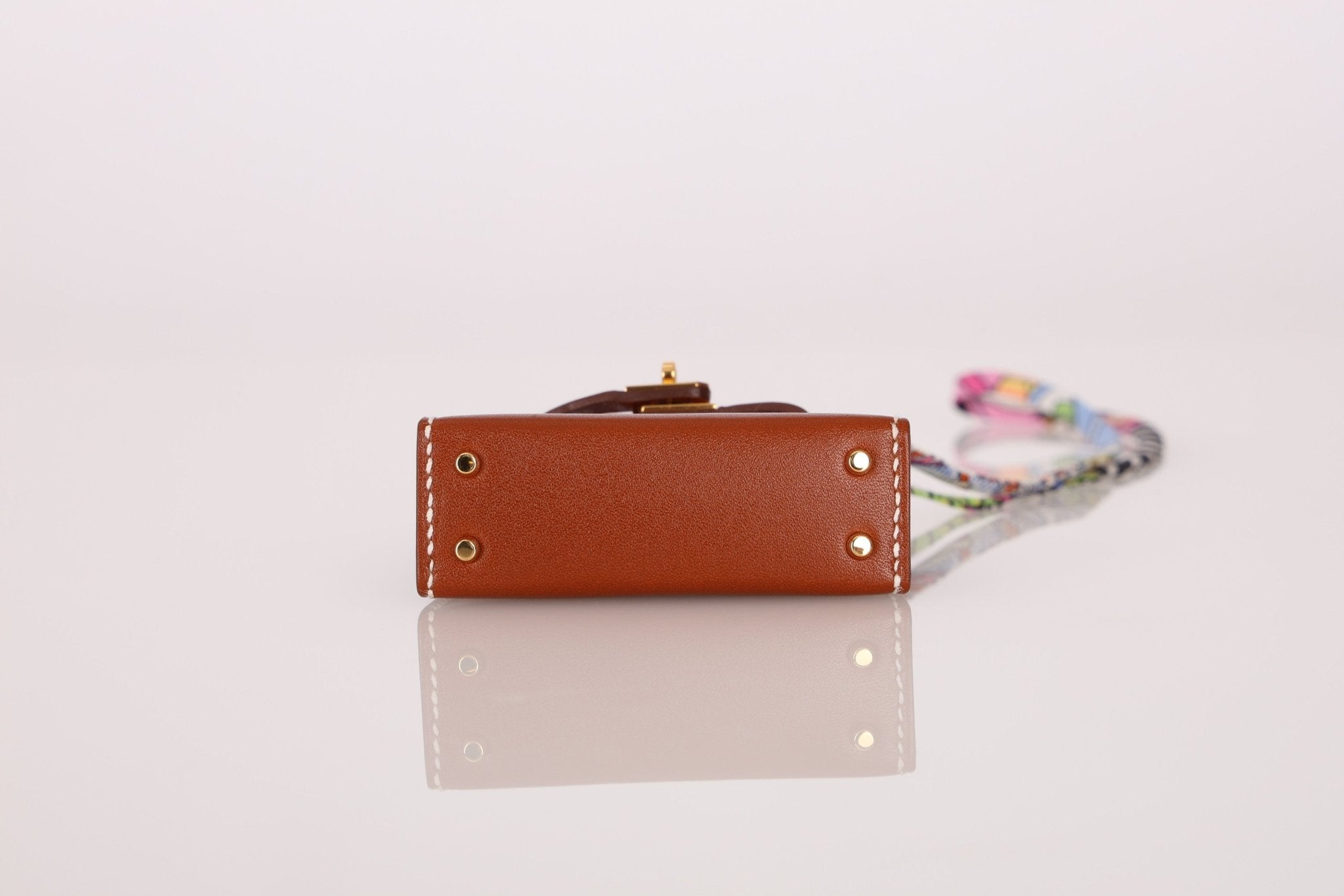 Hermès 2021 Gold Tadelakt Micro Kelly Twilly Bag Charm GHW - FashioNica