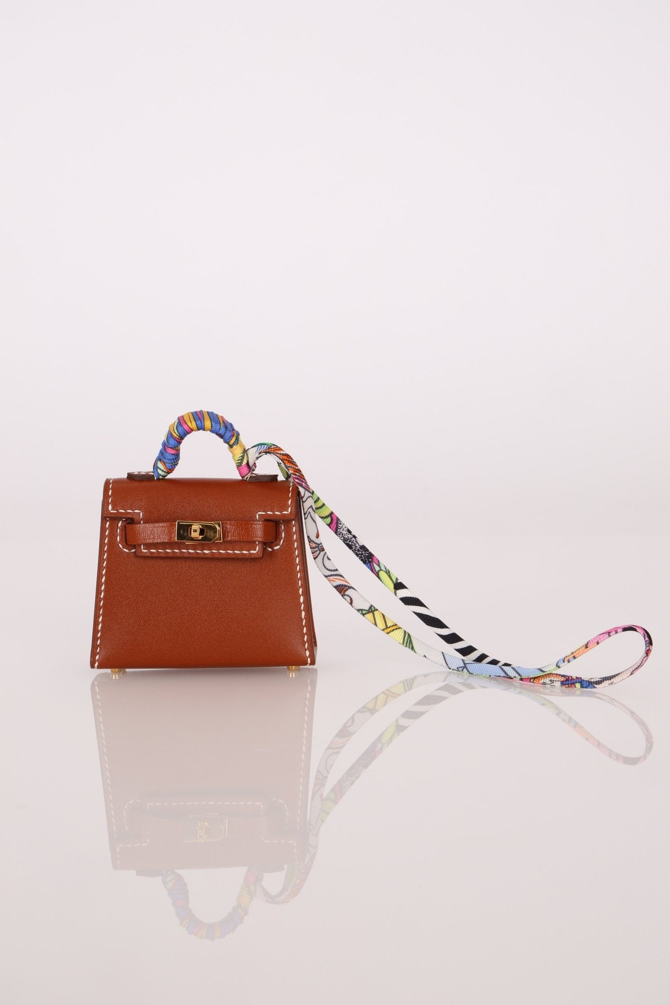 Hermès 2021 Gold Tadelakt Micro Kelly Twilly Bag Charm GHW - FashioNica