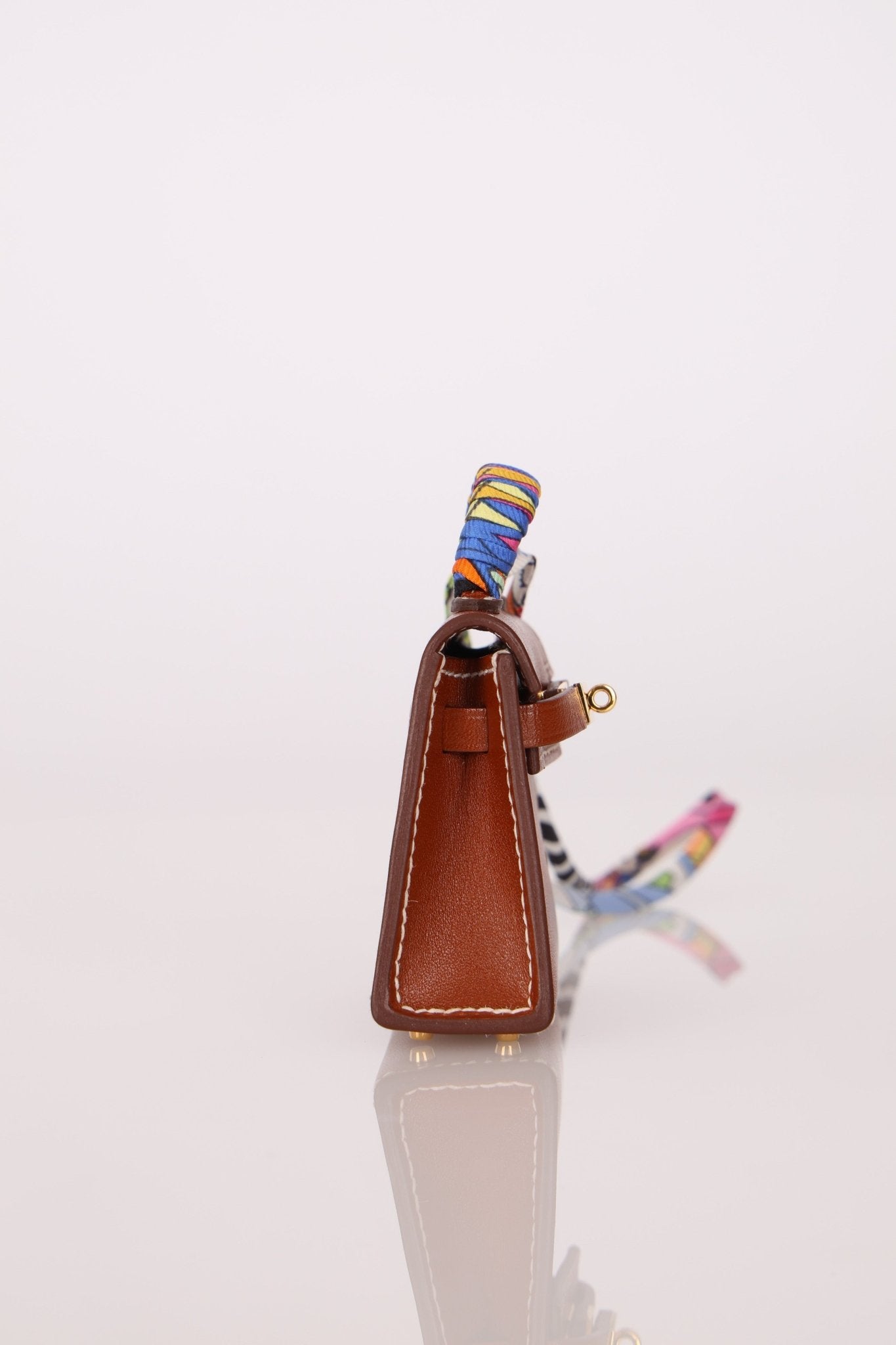 Hermès 2021 Gold Tadelakt Micro Kelly Twilly Bag Charm GHW - FashioNica