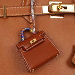 Hermès 2021 Gold Tadelakt Micro Kelly Twilly Bag Charm GHW - FashioNica