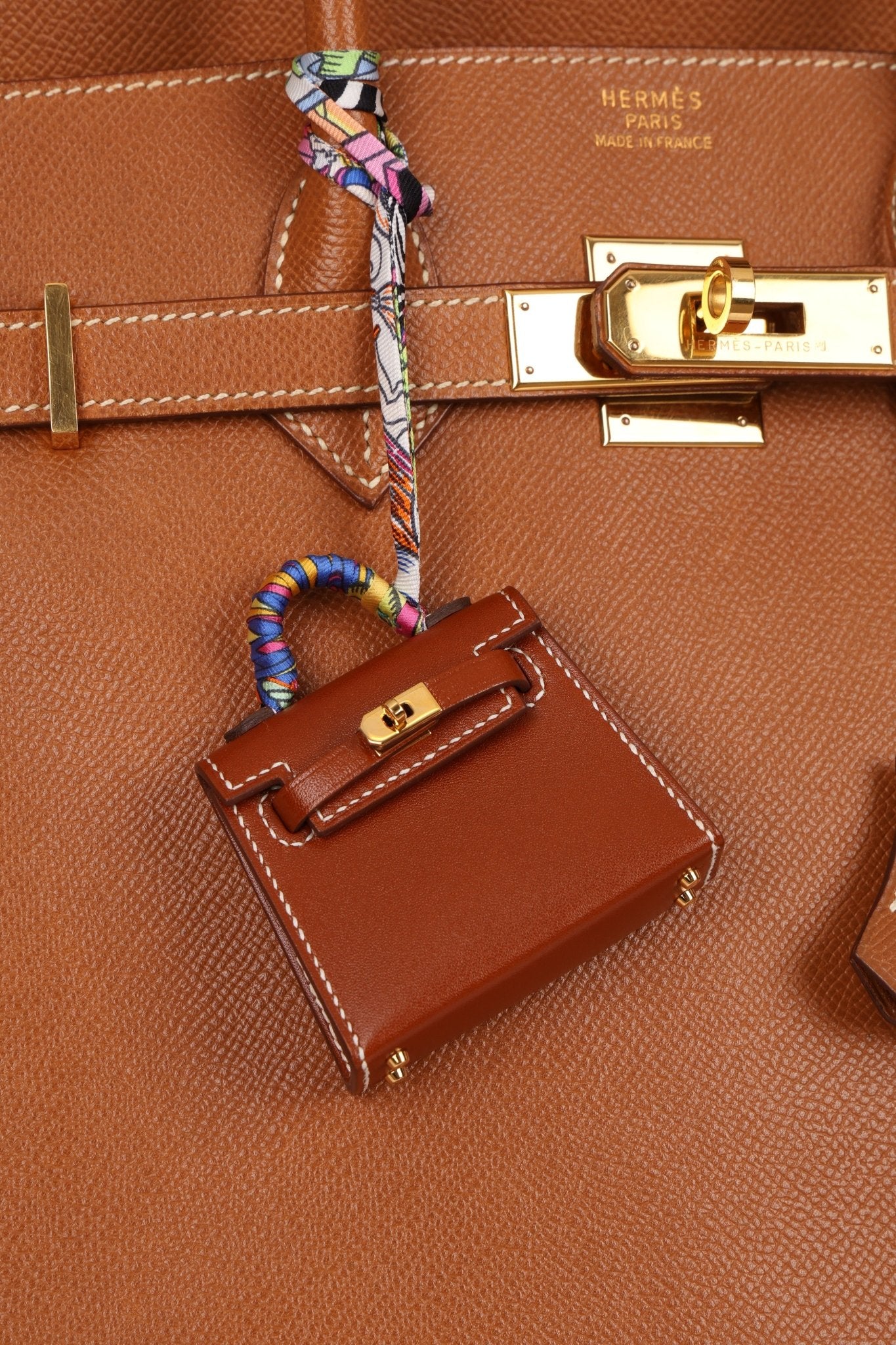 Hermès 2021 Gold Tadelakt Micro Kelly Twilly Bag Charm GHW - FashioNica