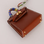 Hermès 2021 Gold Tadelakt Micro Kelly Twilly Bag Charm GHW - FashioNica