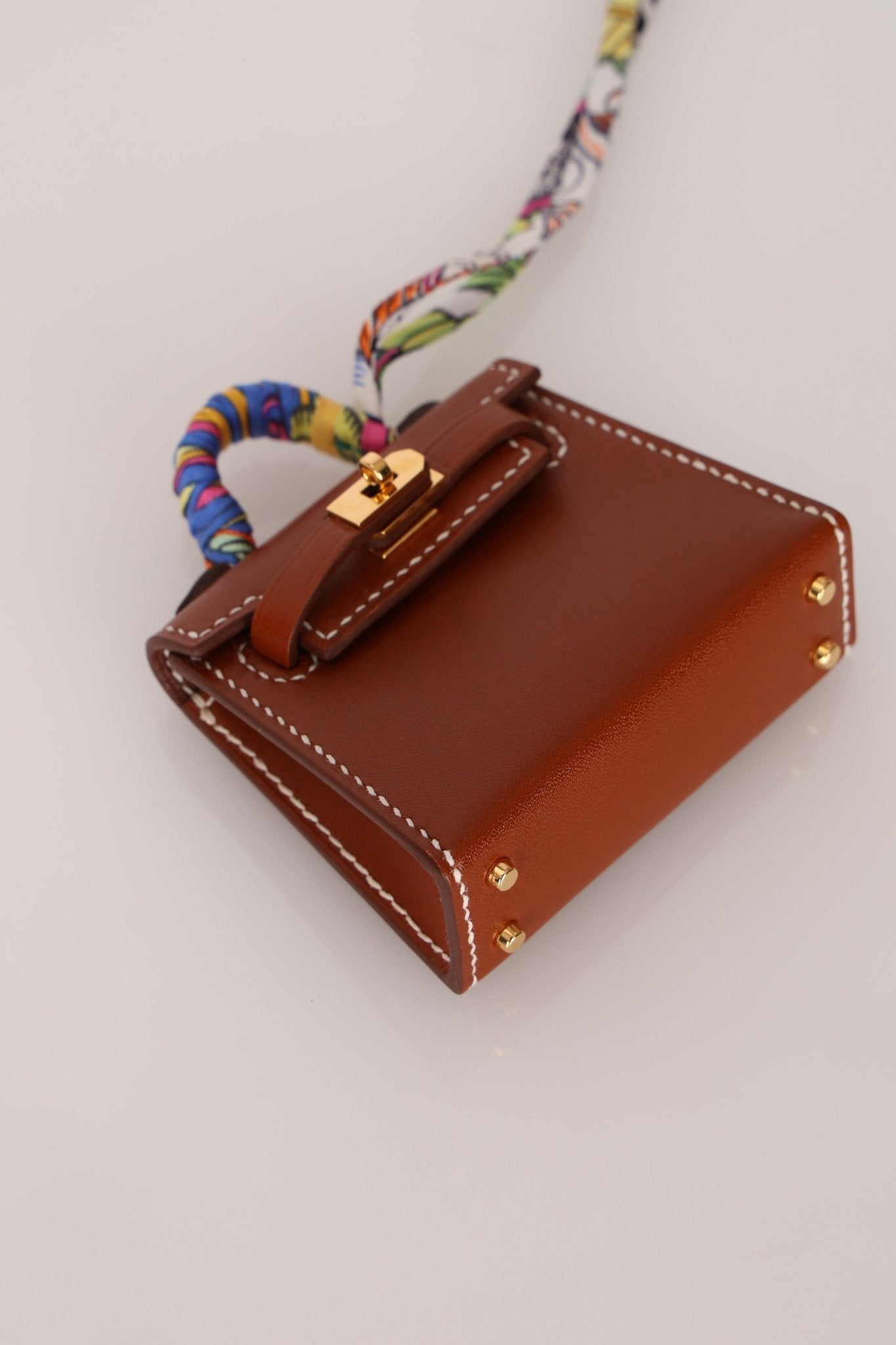 Hermès 2021 Gold Tadelakt Micro Kelly Twilly Bag Charm GHW - FashioNica