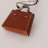 Hermès 2021 Gold Tadelakt Micro Kelly Twilly Bag Charm GHW - FashioNica