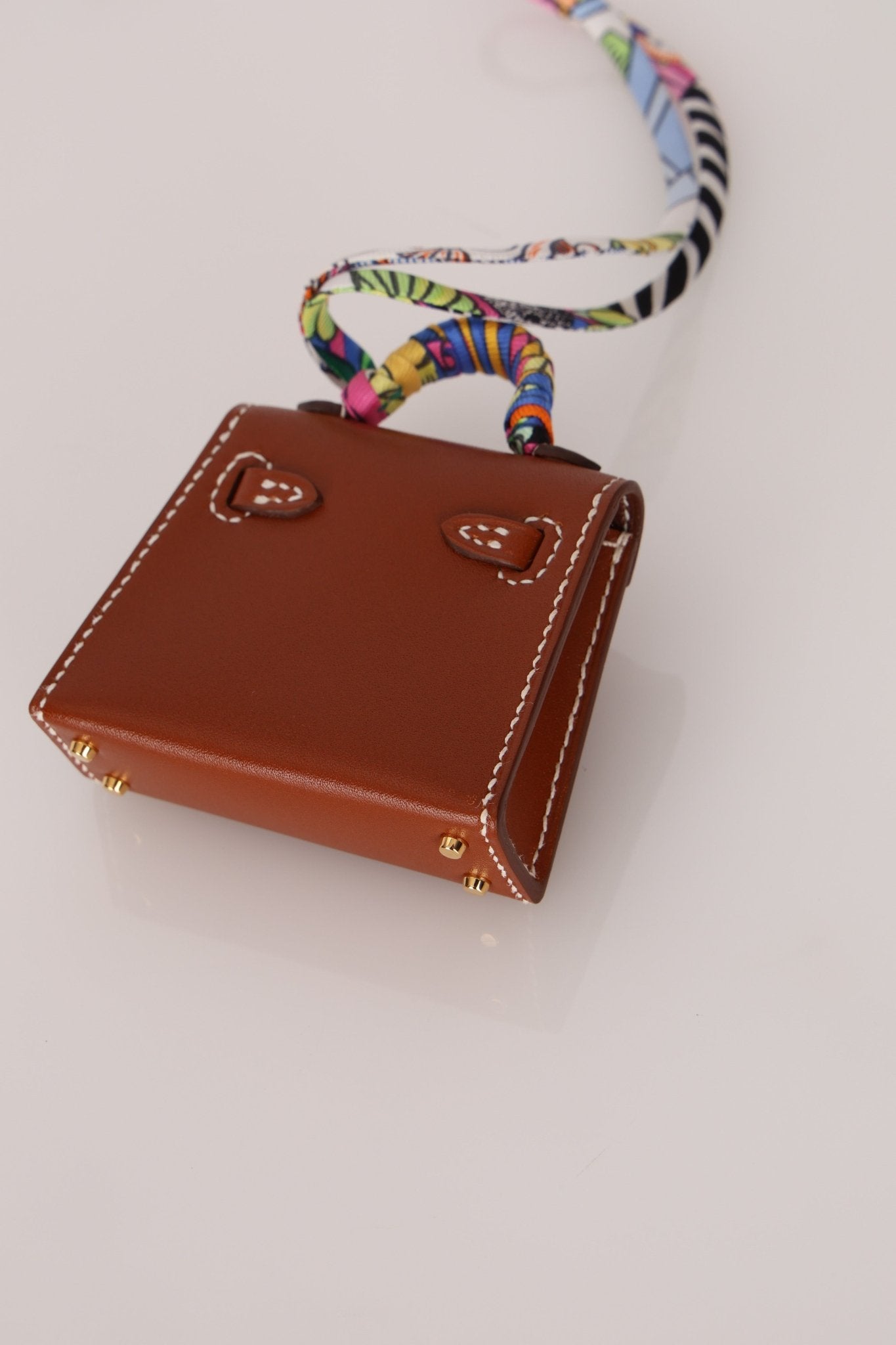 Hermès 2021 Gold Tadelakt Micro Kelly Twilly Bag Charm GHW - FashioNica