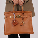 Hermès 2021 Gold Tadelakt Micro Kelly Twilly Bag Charm GHW - FashioNica