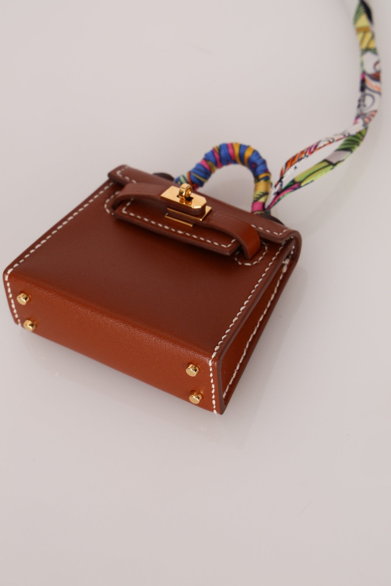 Hermès 2021 Gold Tadelakt Micro Kelly Twilly Bag Charm GHW - FashioNica