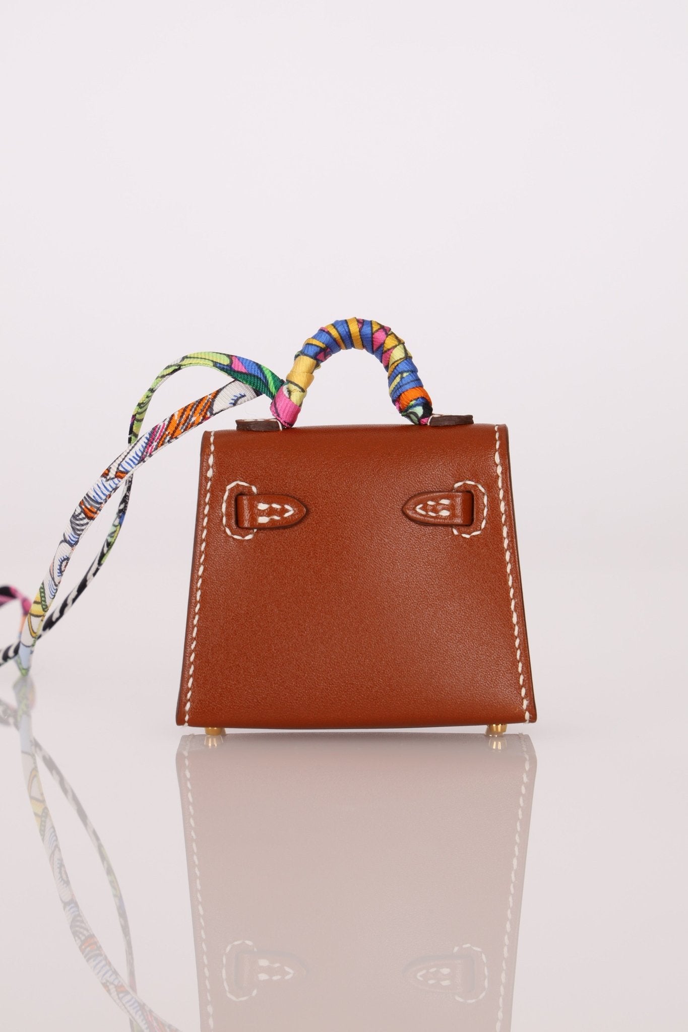 Hermès 2021 Gold Tadelakt Micro Kelly Twilly Bag Charm GHW - FashioNica