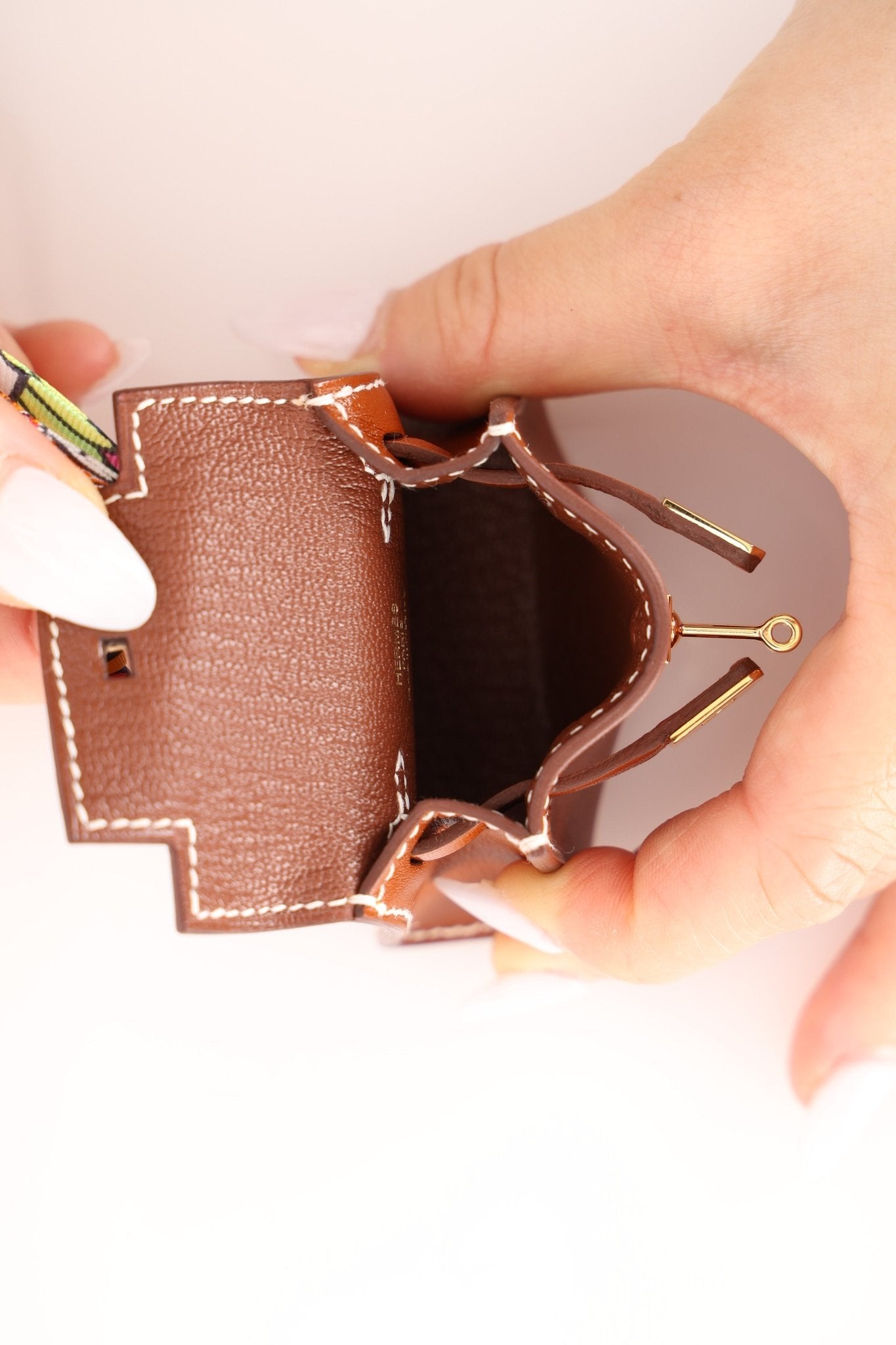 Hermès 2021 Gold Tadelakt Micro Kelly Twilly Bag Charm GHW - FashioNica