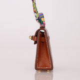 Hermès 2021 Gold Tadelakt Micro Kelly Twilly Bag Charm GHW - FashioNica