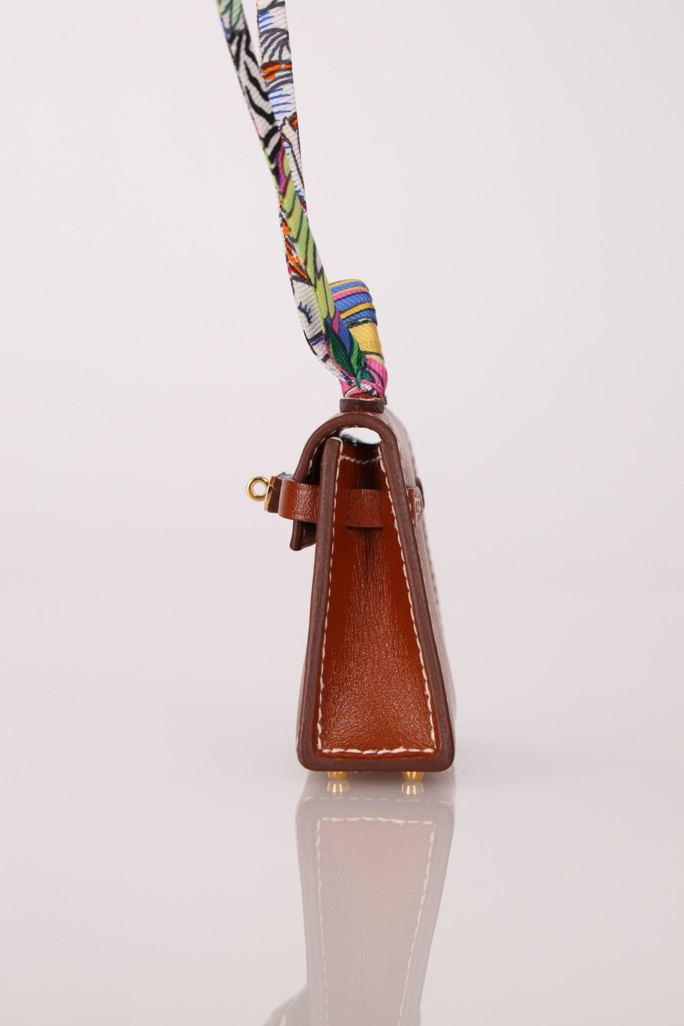 Hermès 2021 Gold Tadelakt Micro Kelly Twilly Bag Charm GHW - FashioNica