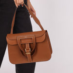 Hermès 2023 Clemence Gold Halzan 31 GHW - FashioNica