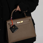 Hermès 2023 Micro Kelly Noir Tadelakt Twilly Bag Charm - FashioNica