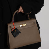 Hermès 2023 Micro Kelly Noir Tadelakt Twilly Bag Charm - FashioNica