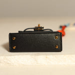 Hermès 2023 Micro Kelly Noir Tadelakt Twilly Bag Charm - FashioNica
