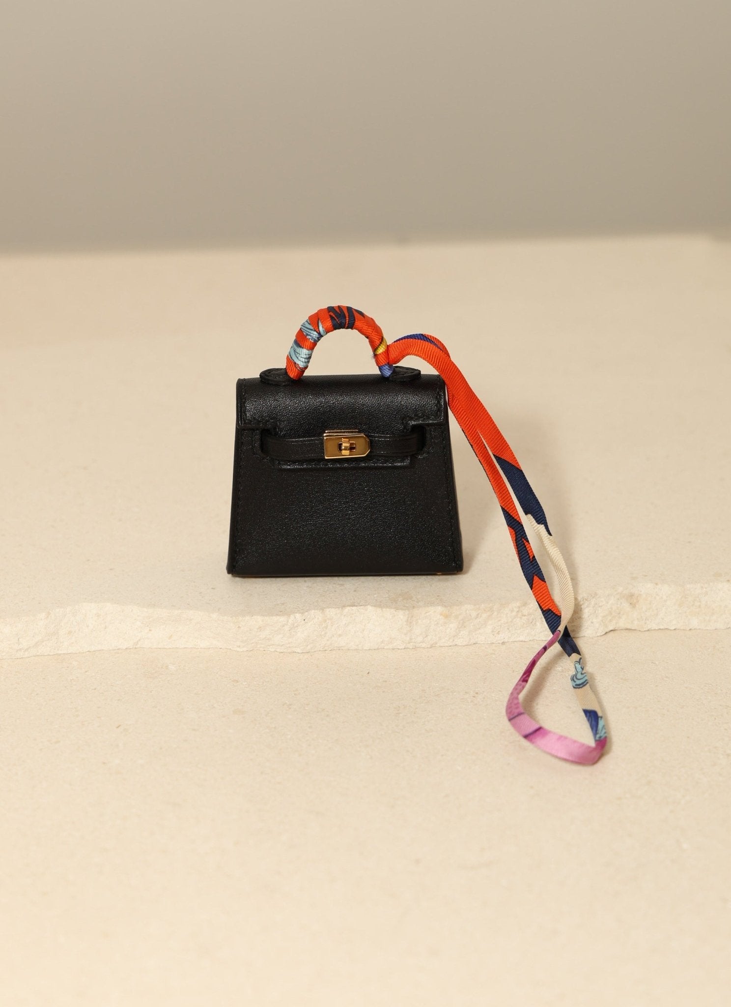 Hermès 2023 Micro Kelly Noir Tadelakt Twilly Bag Charm - FashioNica