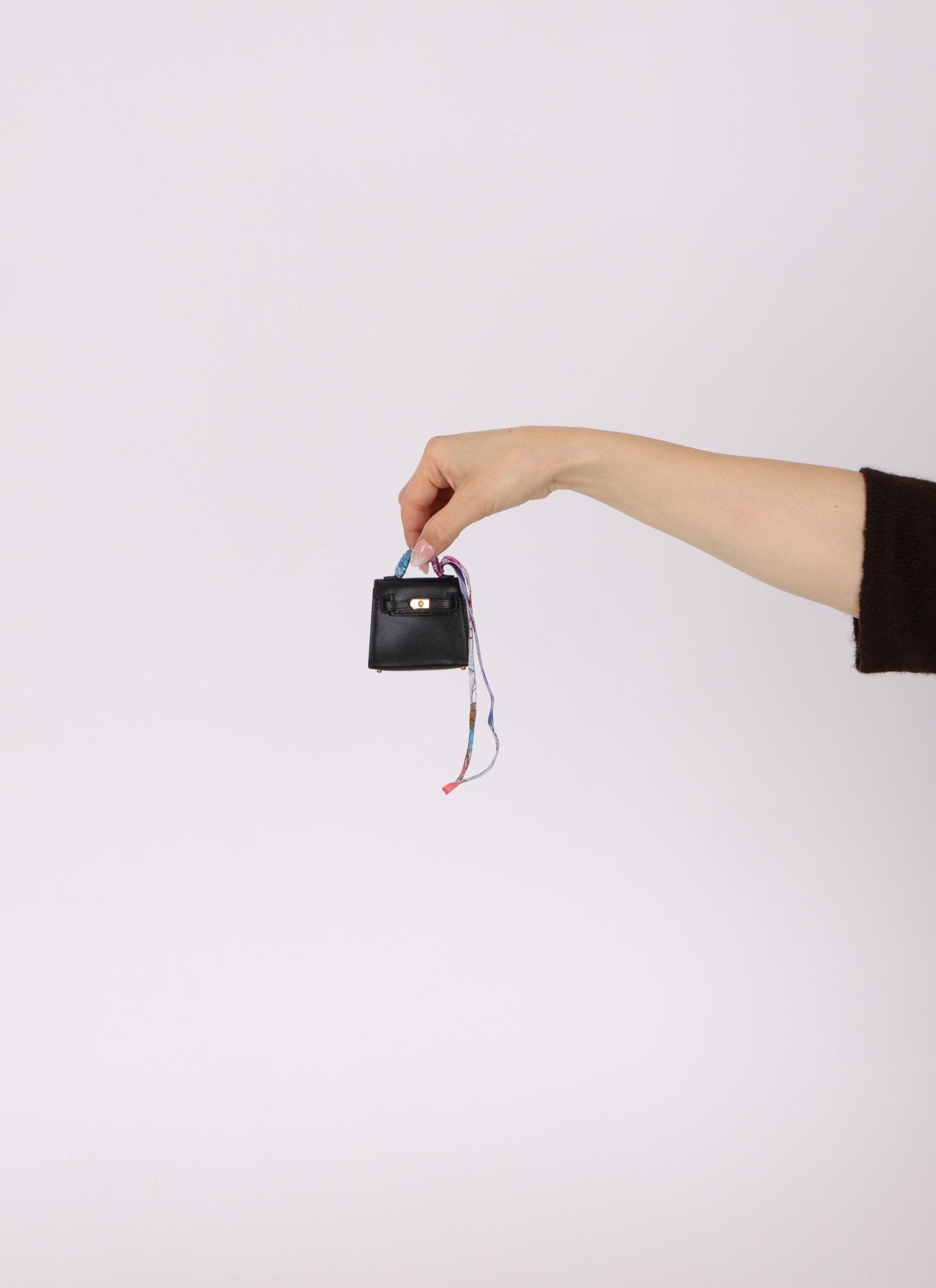 Hermès Noir Tadelakt Micro Kelly Twilly Bag Charm GHW - FashioNica