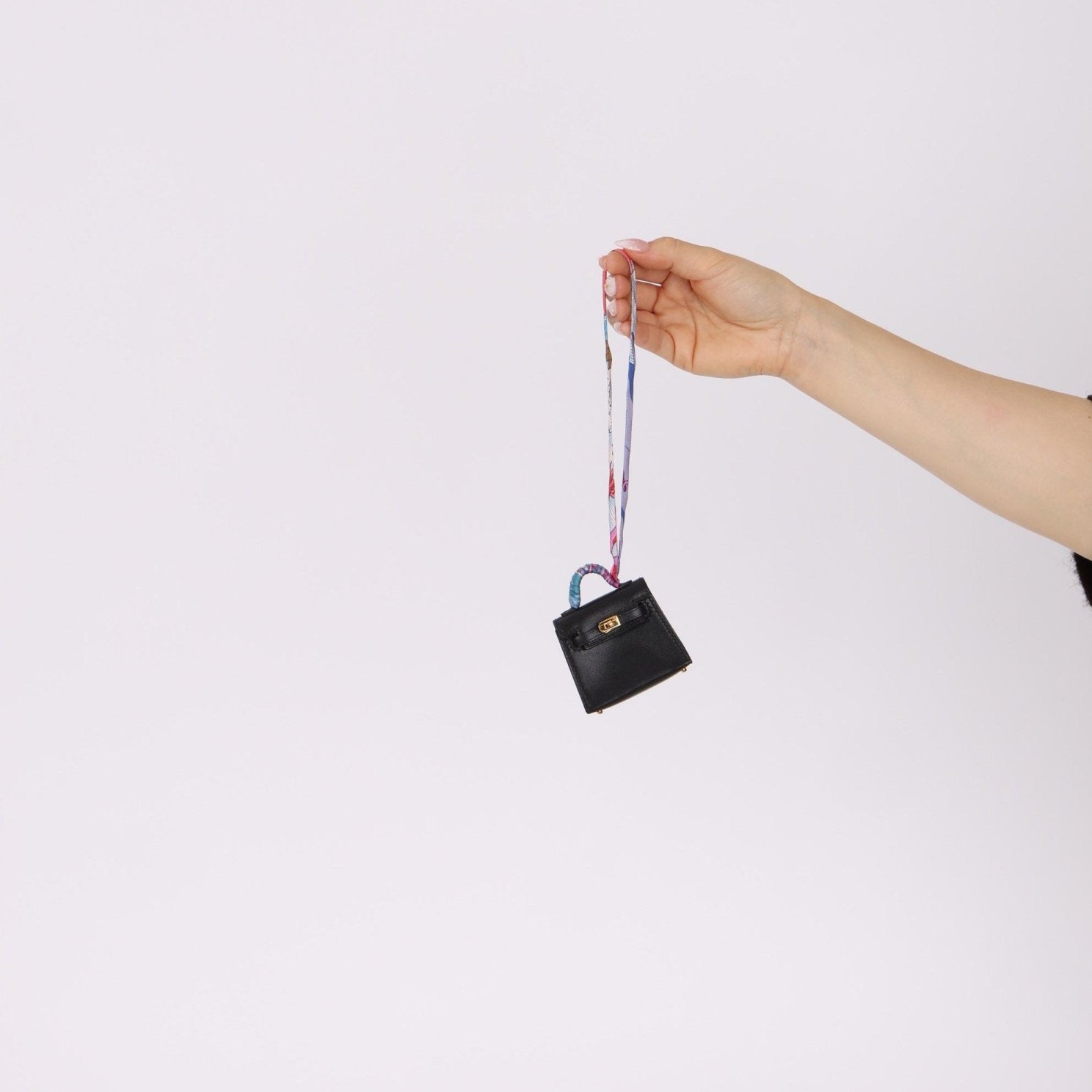 Hermès Noir Tadelakt Micro Kelly Twilly Bag Charm GHW - FashioNica