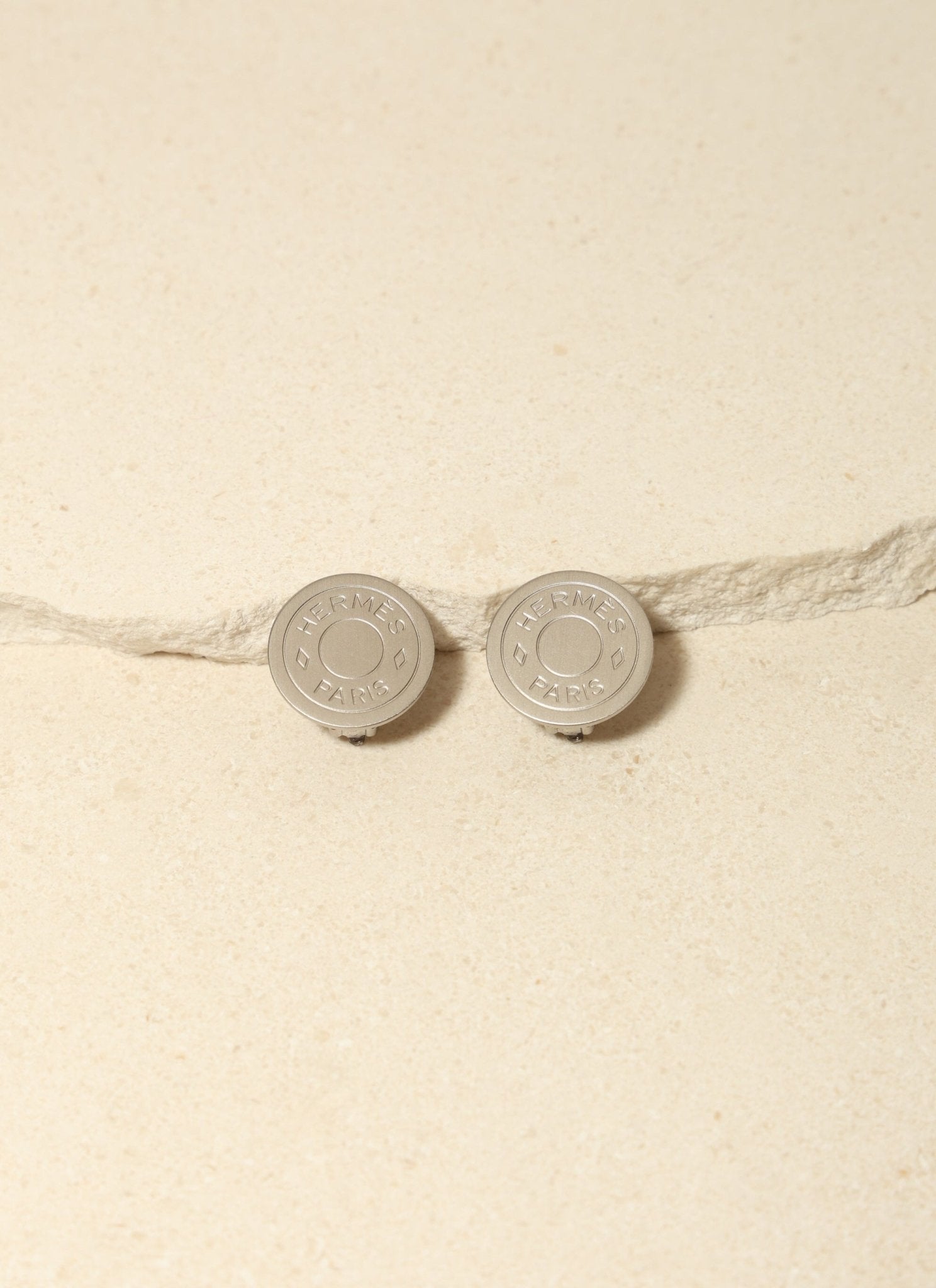 Hermès Silver Matte Clou de Selle Clip - On Earrings - FashioNica