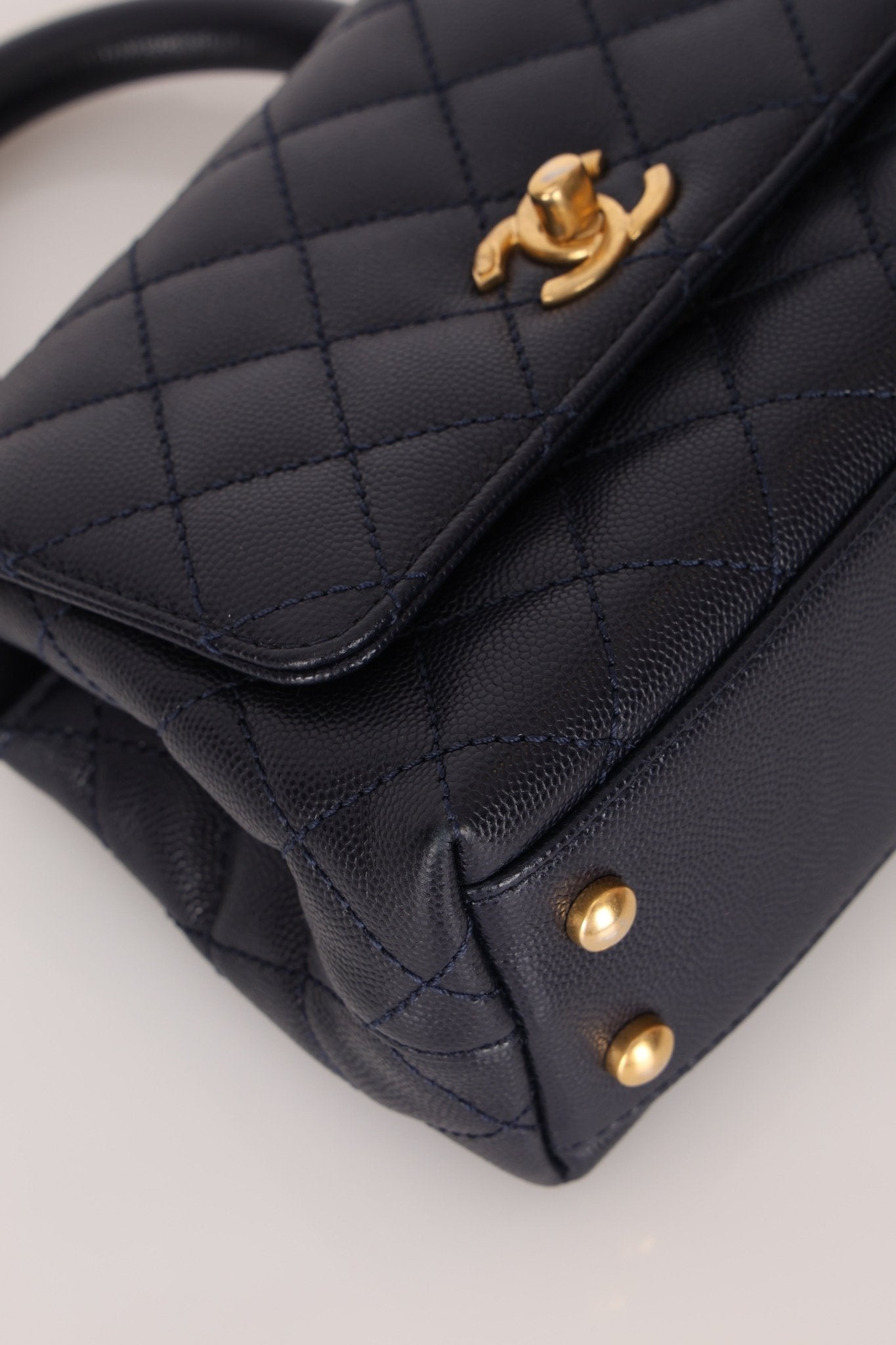 Limited Edition Chanel 23P Caviar Chain Handle Coco Navy Top Handle - FashioNica