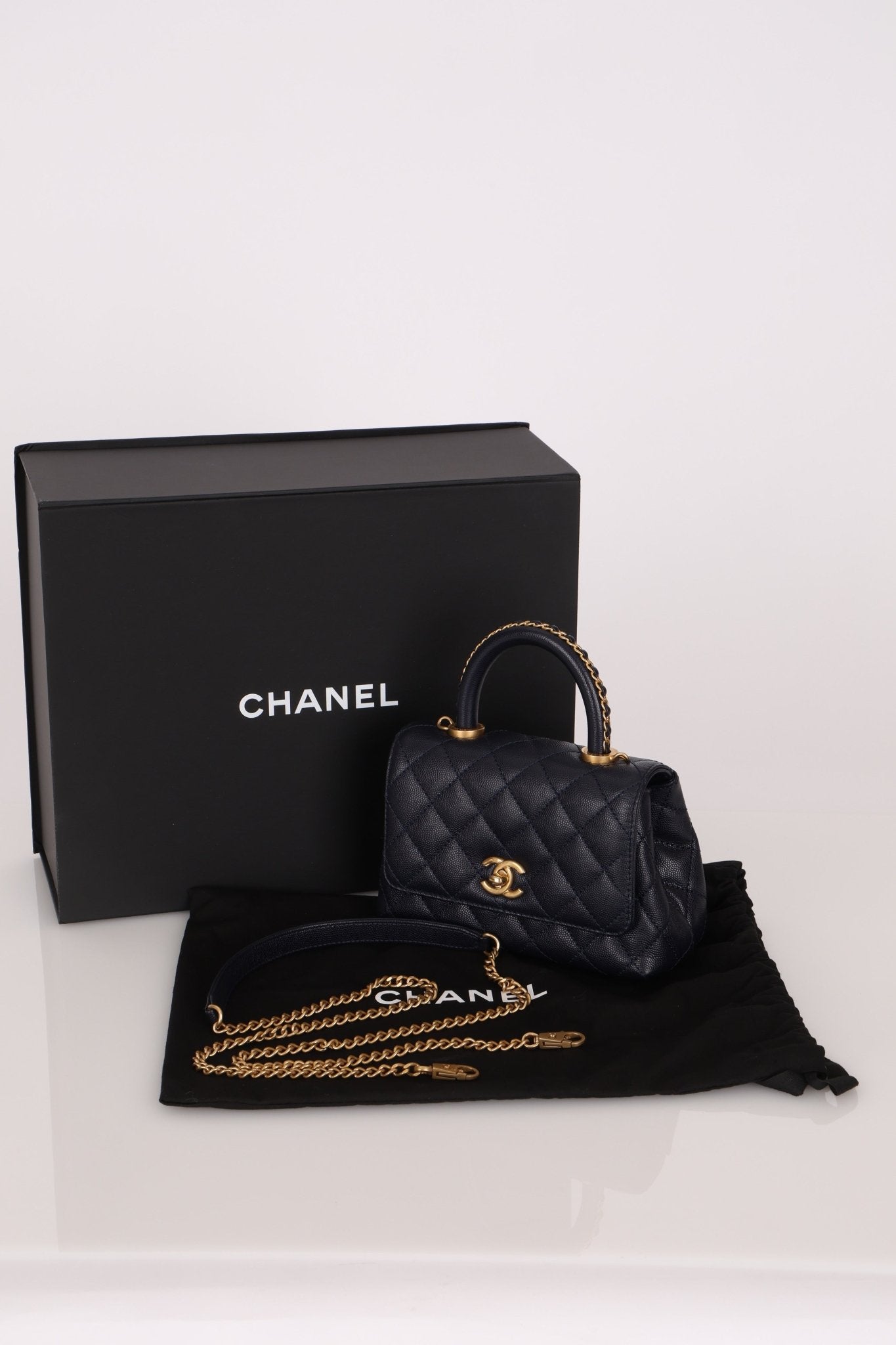 Limited Edition Chanel 23P Caviar Chain Handle Coco Navy Top Handle - FashioNica