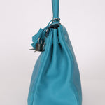 Limited Edition Hermès 2015 Turquoise Togo & Swift Ghillies Kelly 32 PHW - FashioNica
