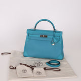 Limited Edition Hermès 2015 Turquoise Togo & Swift Ghillies Kelly 32 PHW - FashioNica
