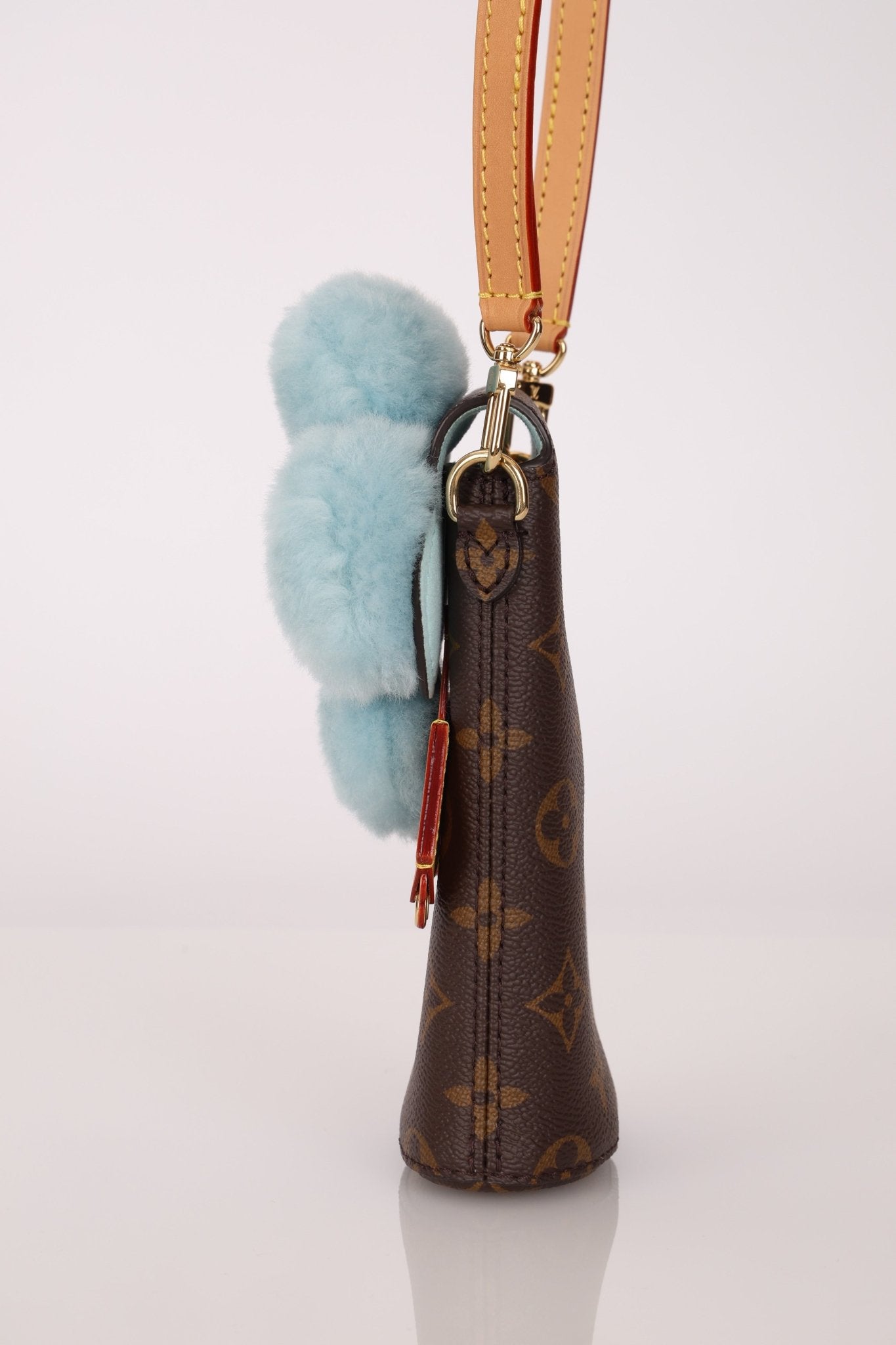 Limited Edition Louis Vuitton 2024 Monogram Vivienne with Azure Frost Shearling Bag - FashioNica