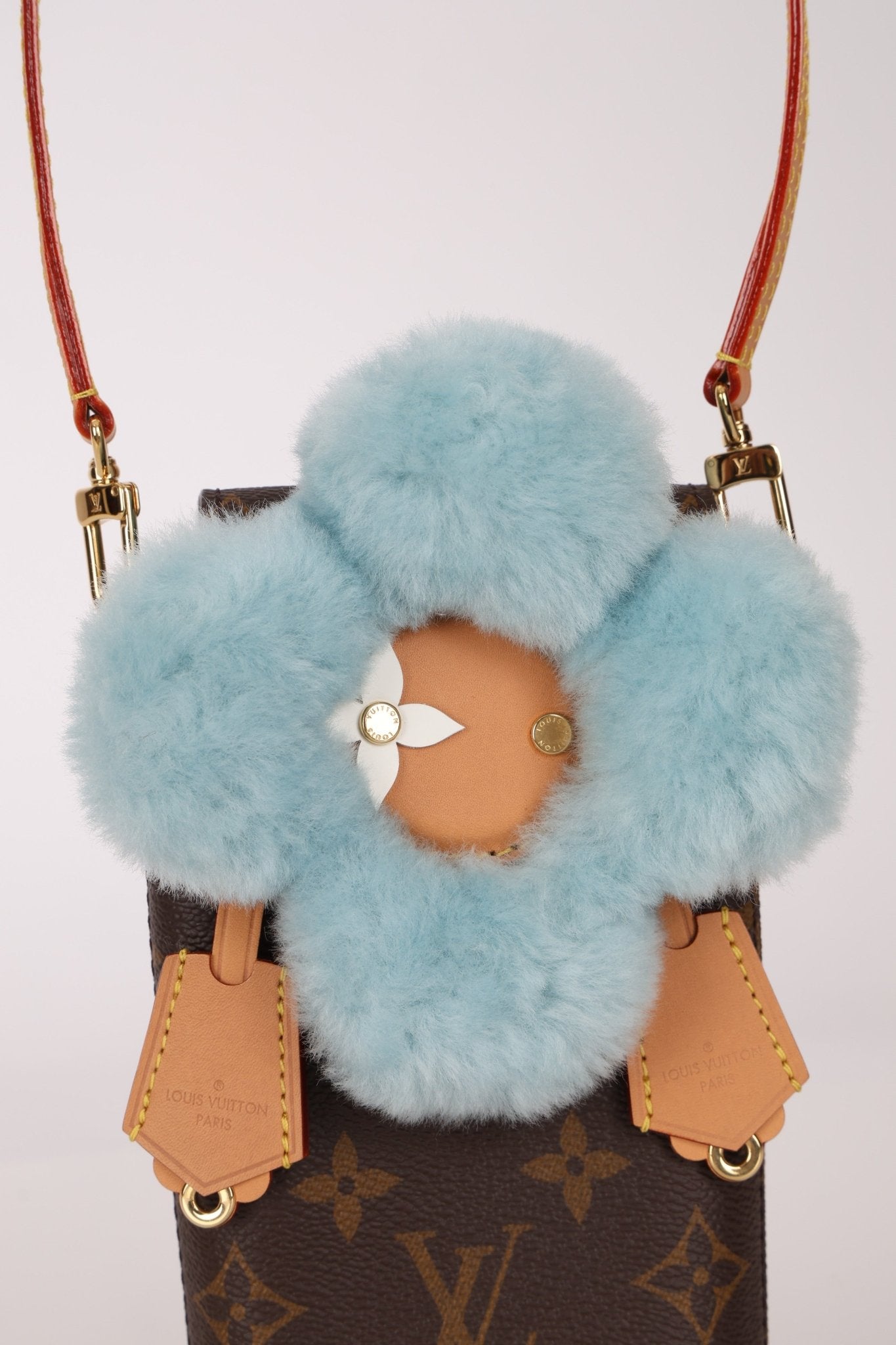 Limited Edition Louis Vuitton 2024 Monogram Vivienne with Azure Frost Shearling Bag - FashioNica