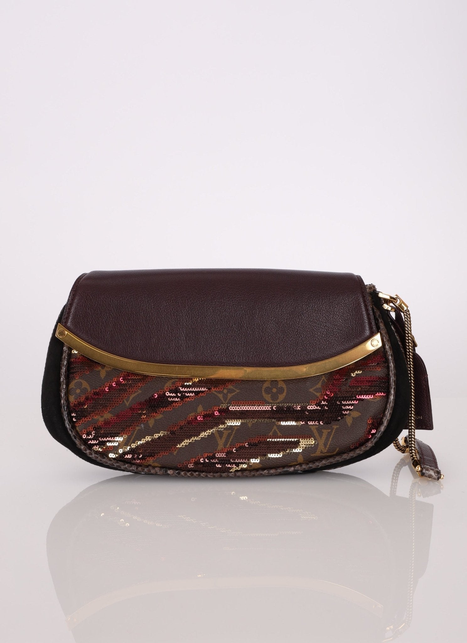 Limited Edition Louis Vuitton Monogram Sauvage Sequin Tiger Clutch - FashioNica