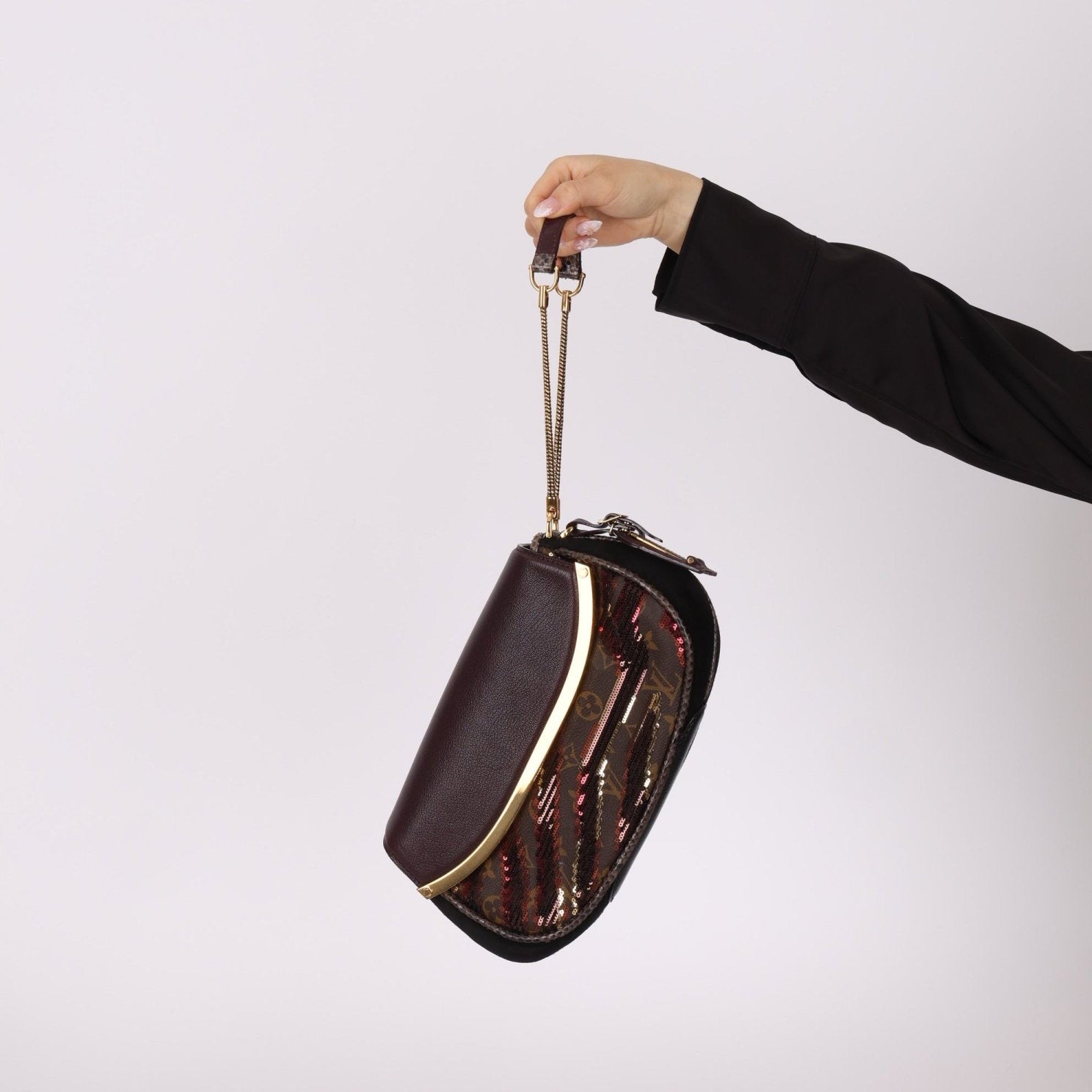 Limited Edition Louis Vuitton Monogram Sauvage Sequin Tiger Clutch - FashioNica