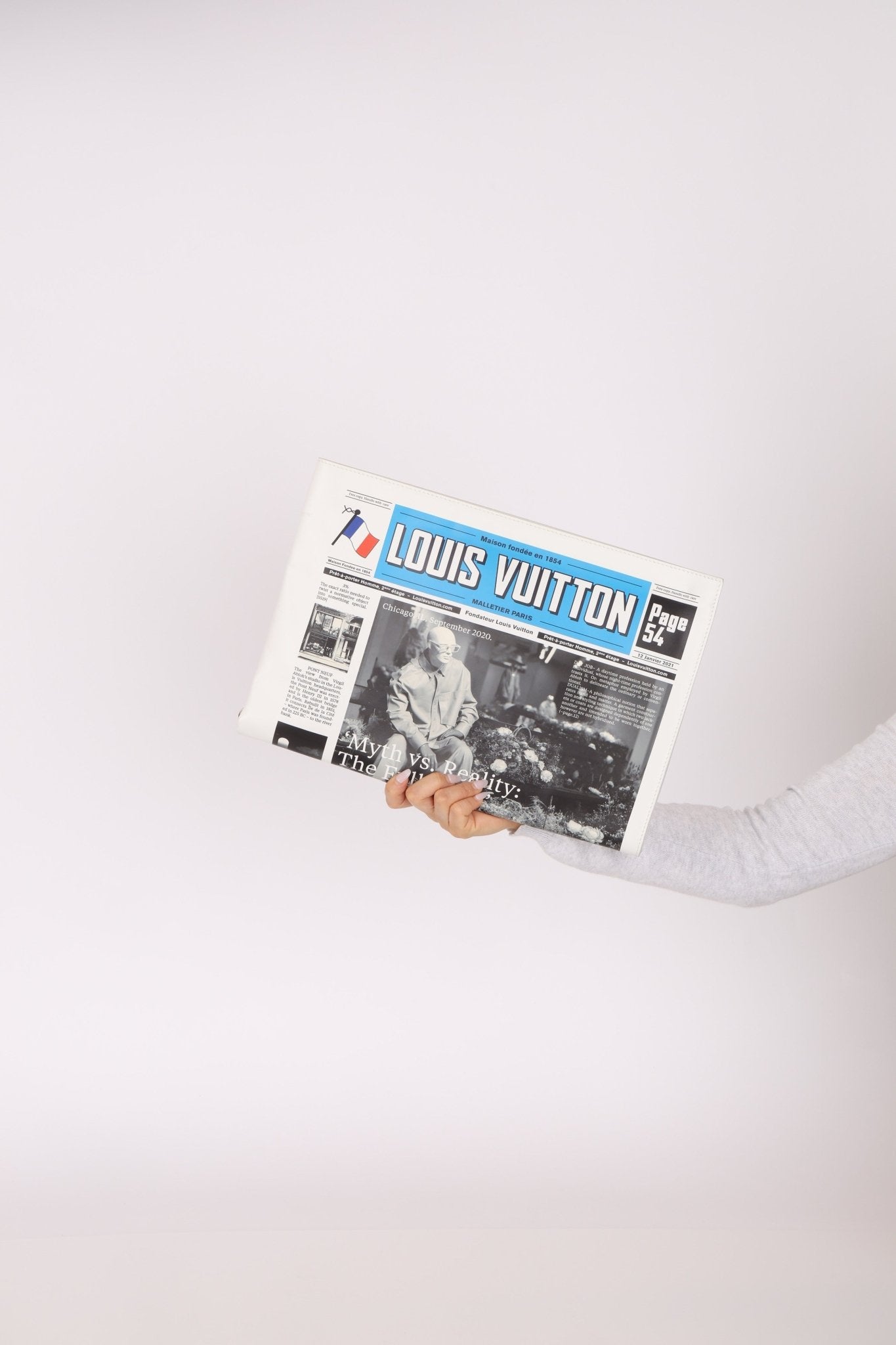Limited Edition Louis Vuitton Newspaper Trompe L'oeil Clutch - FashioNica