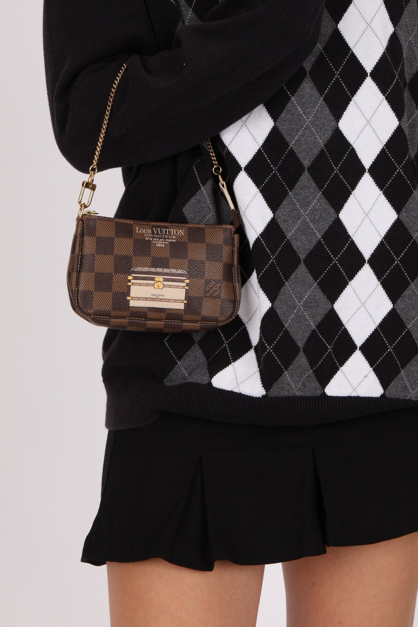 Louis Vuitton Damier Ebene Trunks and Locks Mini Pochette - FashioNica