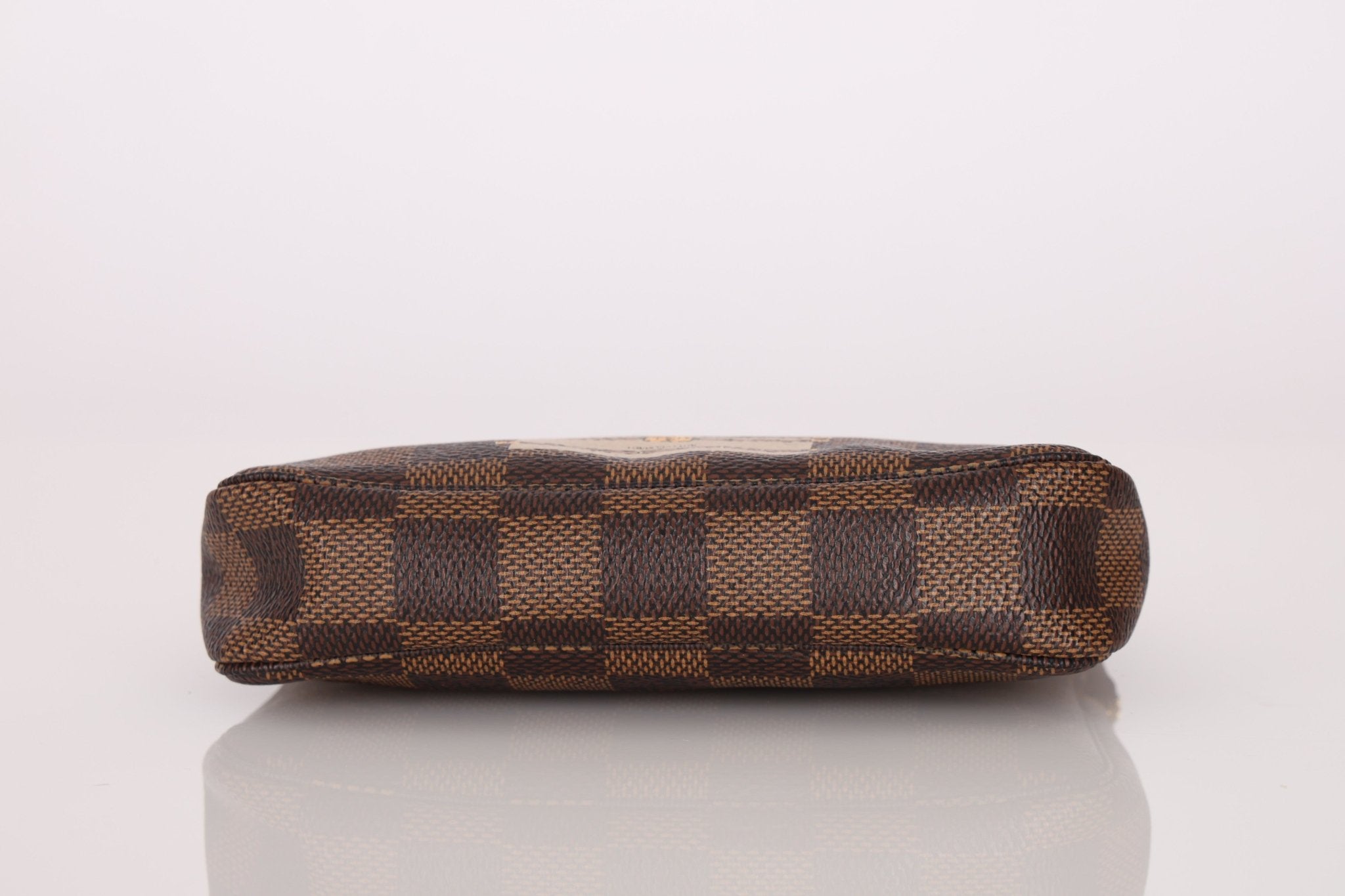 Louis Vuitton Damier Ebene Trunks and Locks Mini Pochette - FashioNica