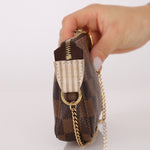 Louis Vuitton Damier Ebene Trunks and Locks Mini Pochette - FashioNica