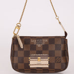 Louis Vuitton Damier Ebene Trunks and Locks Mini Pochette - FashioNica