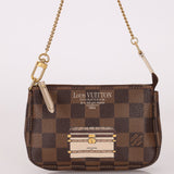 Louis Vuitton Damier Ebene Trunks and Locks Mini Pochette - FashioNica