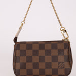 Louis Vuitton Damier Ebene Trunks and Locks Mini Pochette - FashioNica