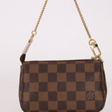 Louis Vuitton Damier Ebene Trunks and Locks Mini Pochette - FashioNica
