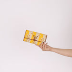 Louis Vuitton Striped Canvas Capucines Long Wallet - FashioNica