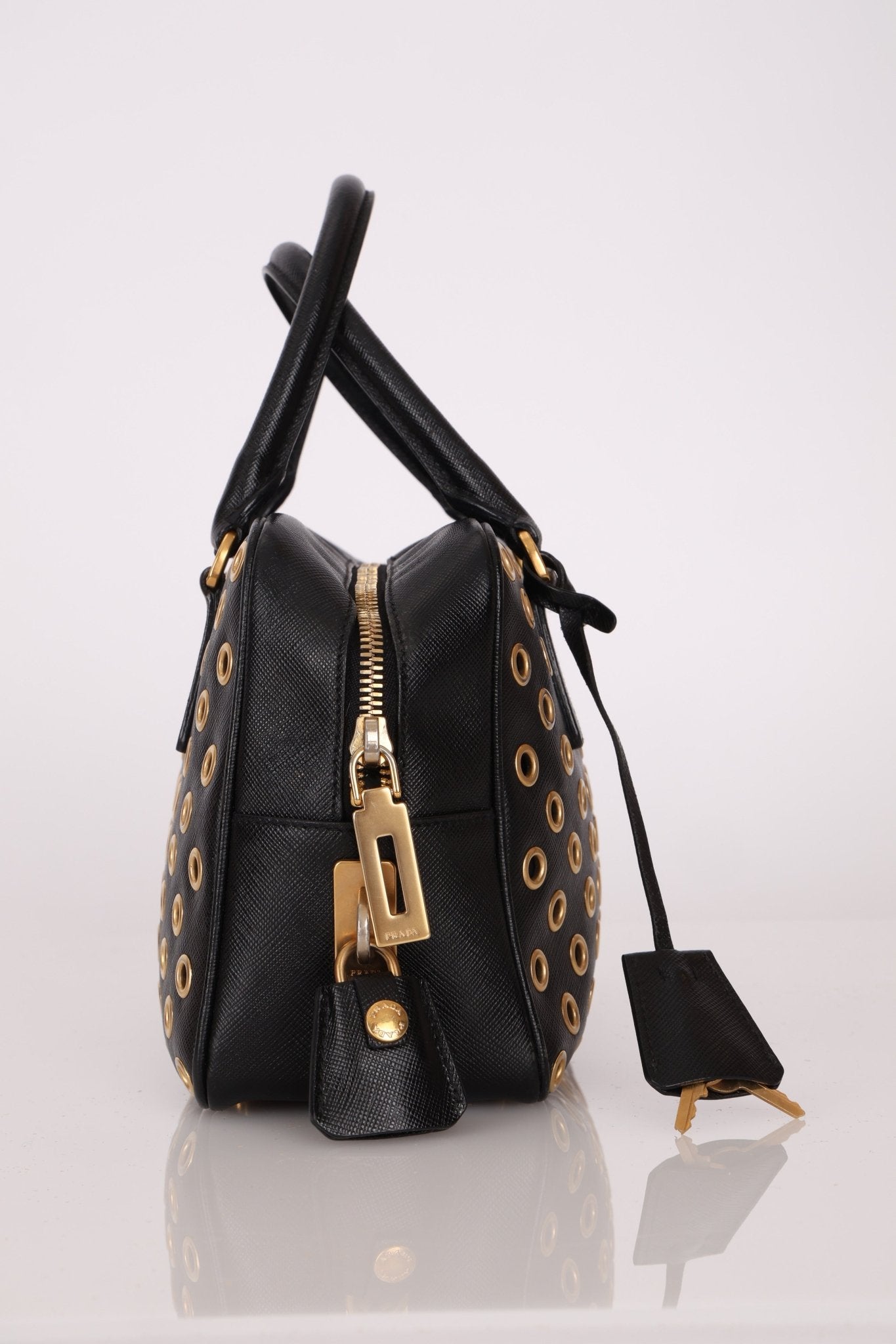 Prada Saffiano Grommet Bauletto Bowler Bag - FashioNica