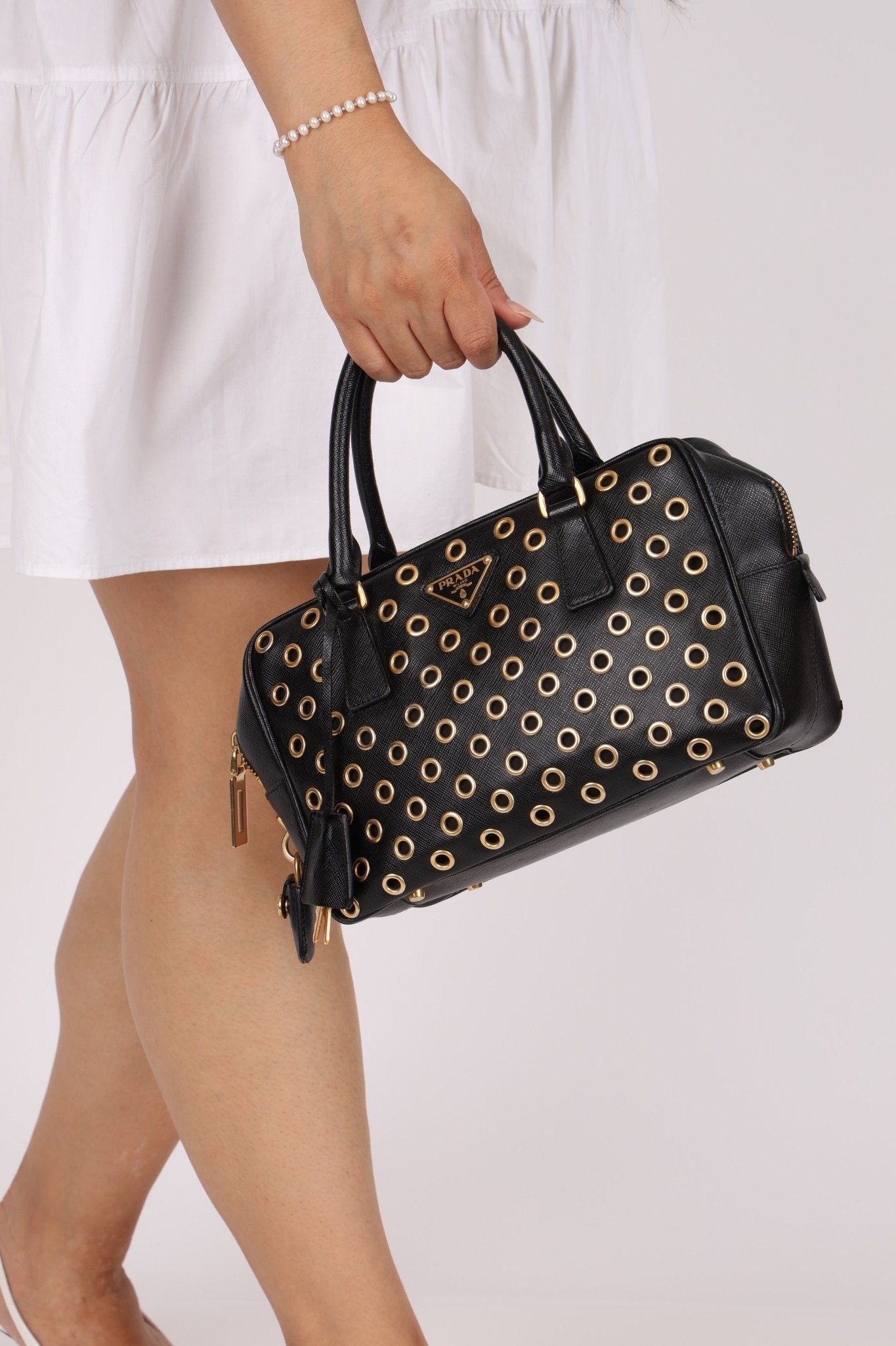 Prada Saffiano Grommet Bauletto Bowler Bag - FashioNica