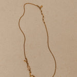 Saint Laurent Crystal Logo Pendant Necklace - FashioNica