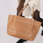 Saint Laurent Rive Gauche Tote Tag in Vegetable - Tanned Leather - FashioNica