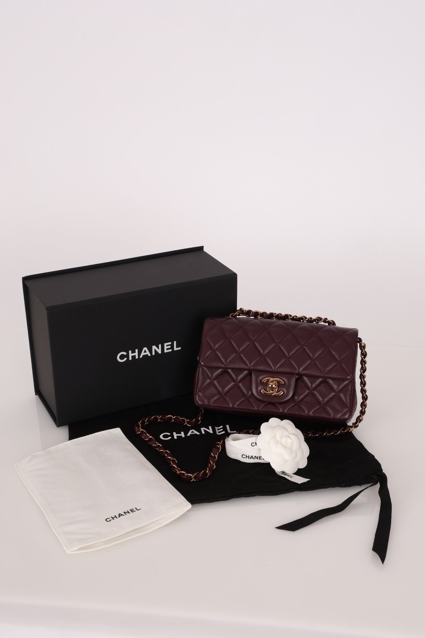 Ultra - Rare Chanel 2024 Bordeaux Lambskin Mini Rectangular Rose Gold Hardware Flap Bag - FashioNica