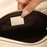 Gucci Embossed Mini Pochette