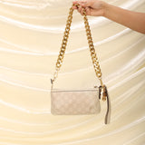 Gucci Embossed Mini Pochette