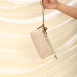 Gucci Embossed Mini Pochette